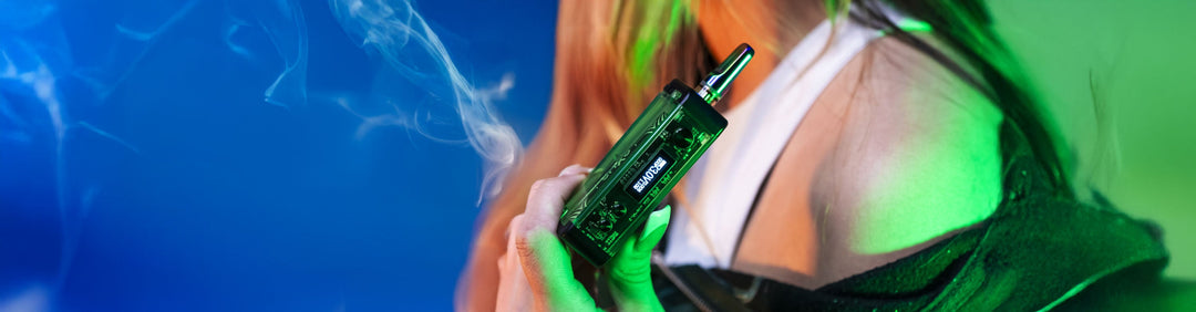 Woman holding Exxus Adapt in front of blue and green studio background
